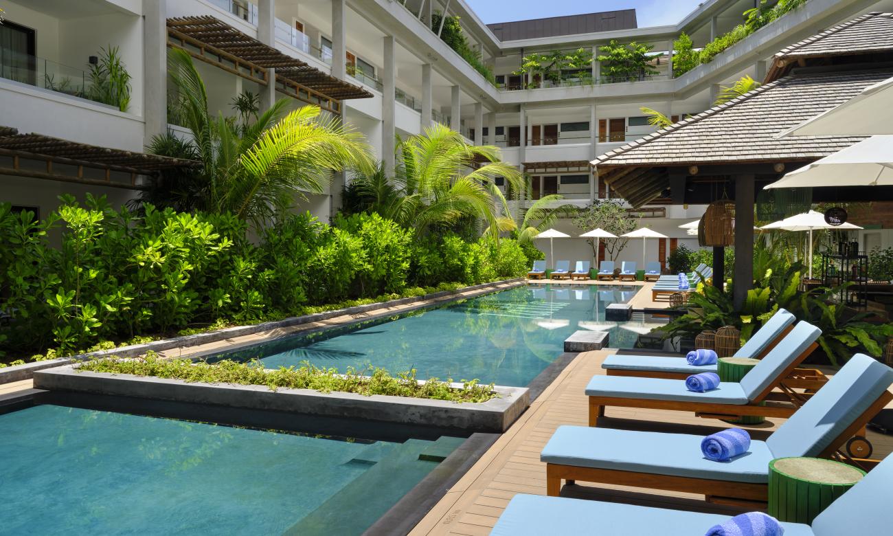 View of the pool and deck chairs