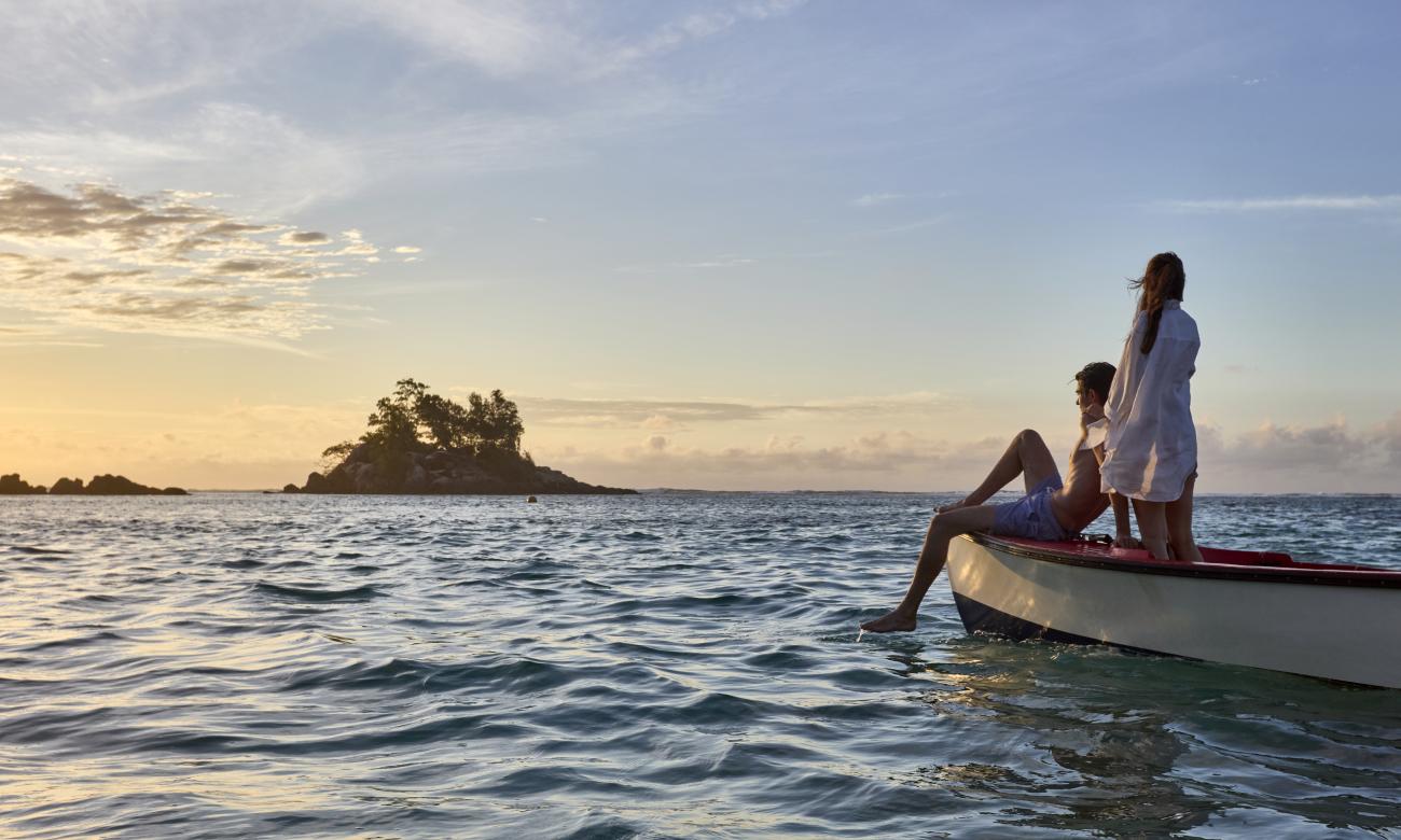 Couple on a boat at sea