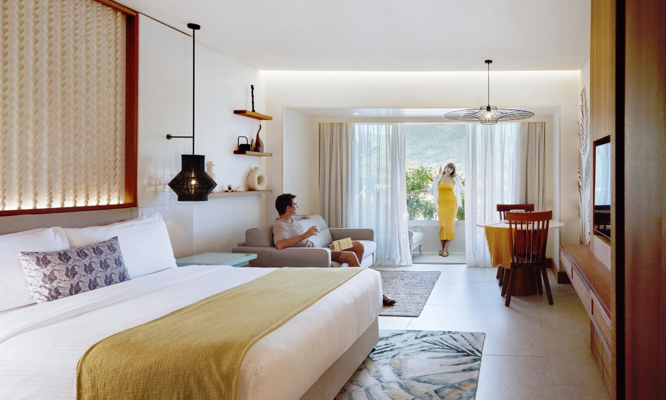 Couple Lounging in the Junior Suite